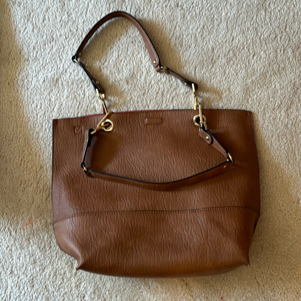 Great brand beautiful luggage color large shoulder bag. Red lined.